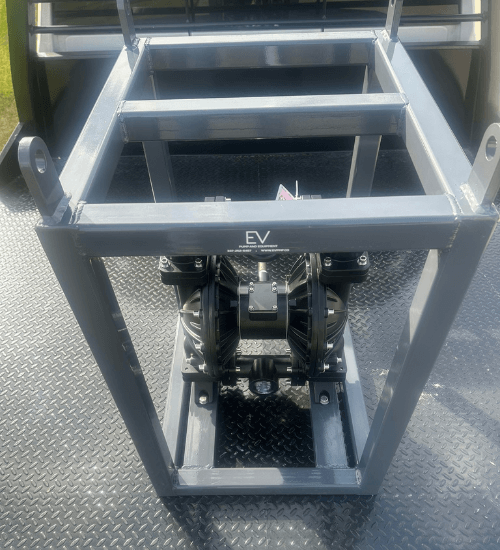 Newly fabricated gray metal pump frame mounted on a truck bed, featuring an EV Pump & Equipment logo and an air-operated diaphragm pump inside.