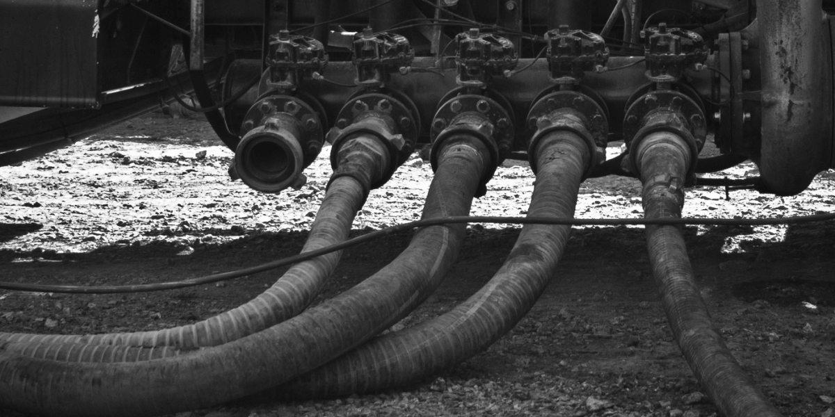 Front view of a well servicing pump truck intake manifold.