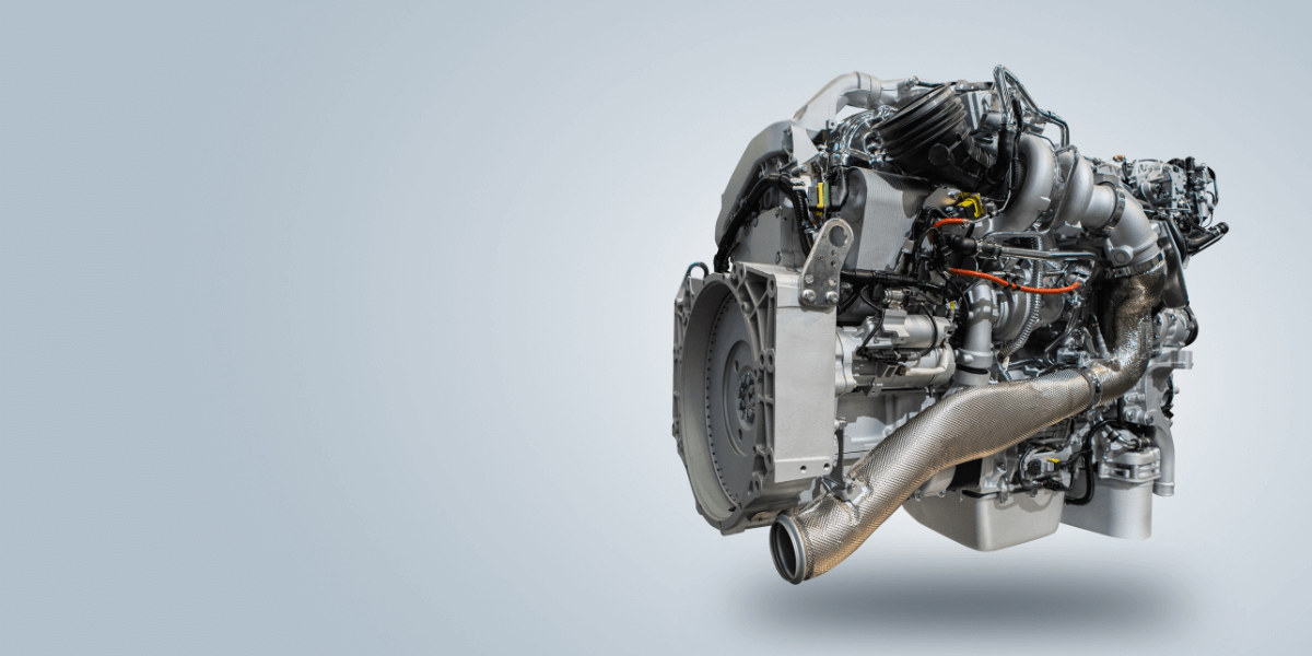 Modern diesel pump engine with visible exhaust system and components, representing Tier 3 and Tier 4 engine technology choices compared to electric-driven pumps.